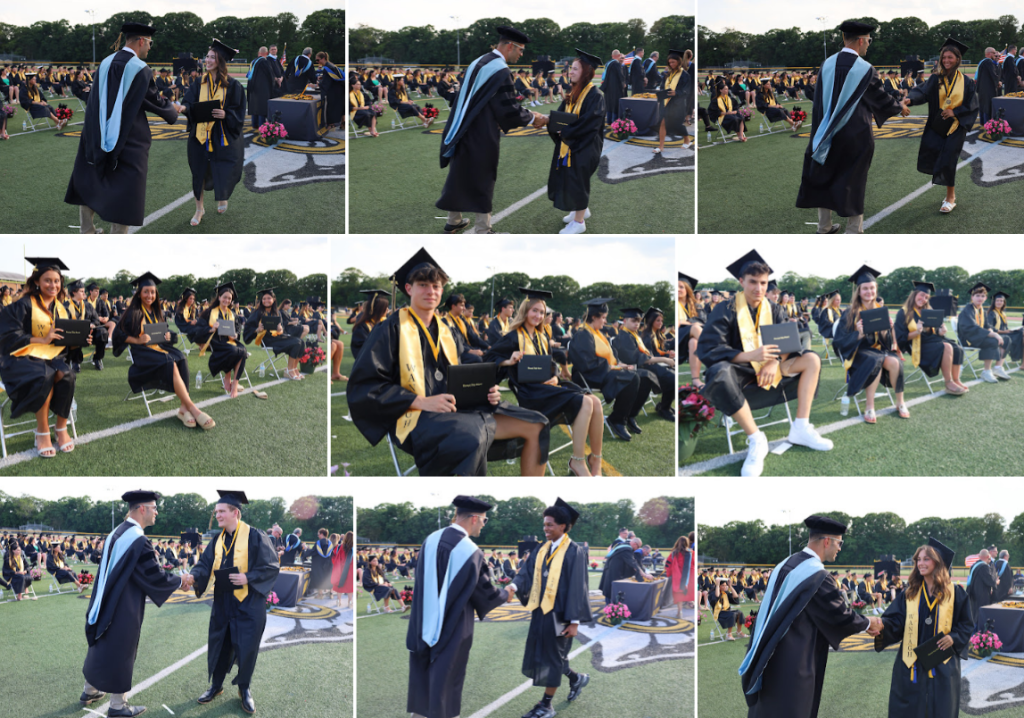 students receiving diplomas and shaking mans hand